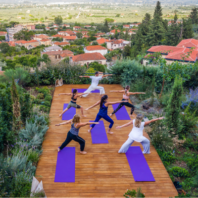 Euphoria Retreat Greece Group Yoga Class Deck Outdoor