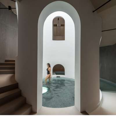 Euphoria Retreat Woman in Pool Skylight