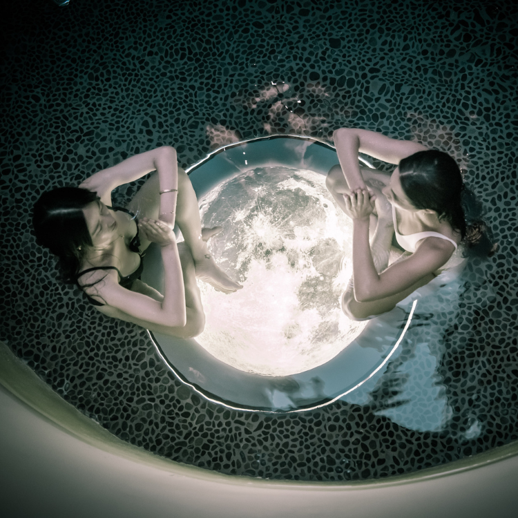 Women Talking in Pools at Euphora Retreat